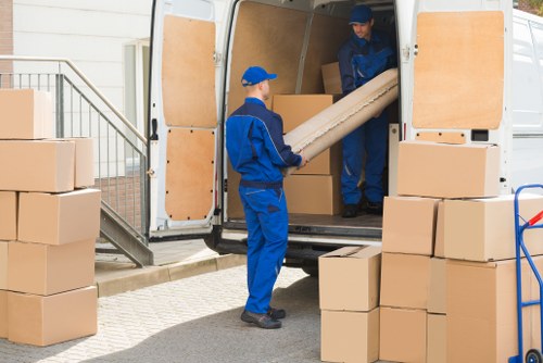 Removal van and moving boxes for a home move in The Hale