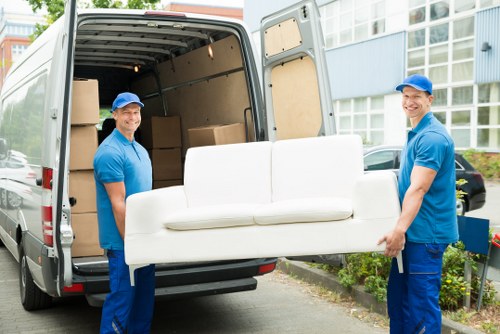 Local removals team helping with a home move in The Hale