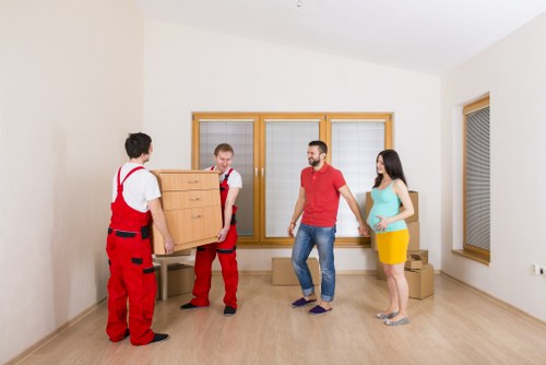 Professional movers handling a residential move near The Hale