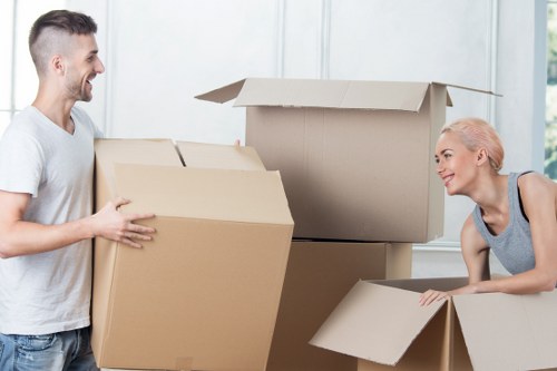 Packed boxes and furniture ready for a local move service